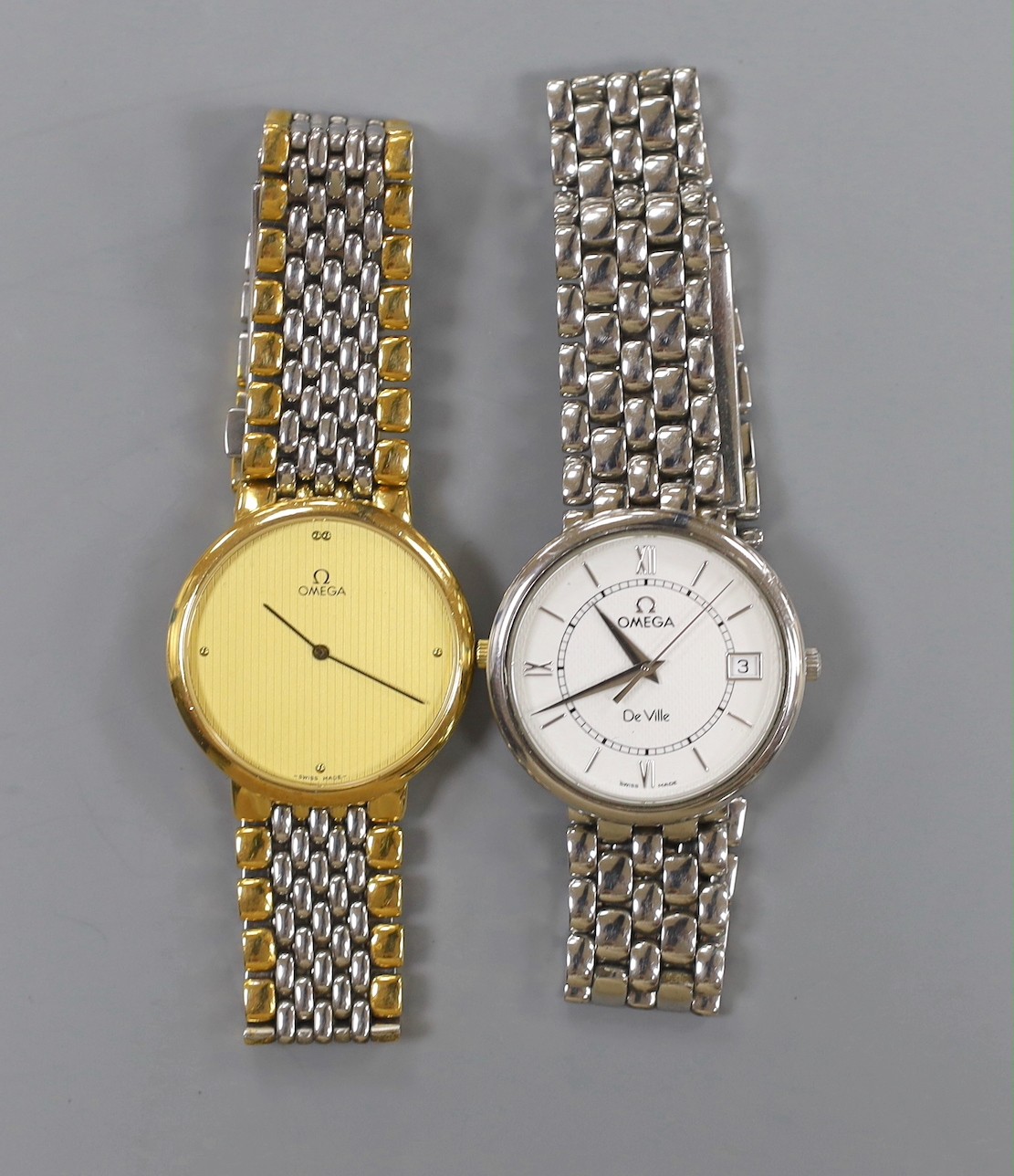A gentleman's stainless steel Omega De Ville quartz wrist watch and a similar two tone Omega quartz wrist watch, no box or papers.